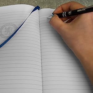 Chelsea notebook being written into with chelsea pen