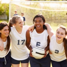 girls playing football