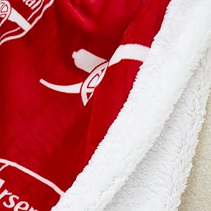 Close-up shots of red and white textured fabric or material with embroidered or printed white designs against red background.