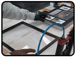 Series of images showing tablet or digital device with blue protective film or covering being applied or adjusted.