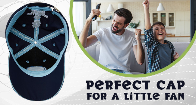 Navy baseball cap with light blue interior and cross-shaped stitching. Text reads 'PERFECT CAP FOR A LITTLE FAN'.