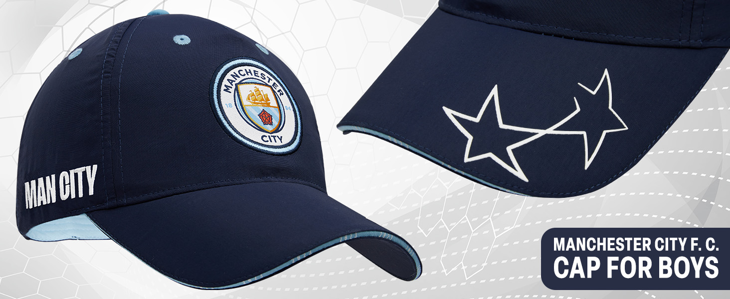 Manchester City navy blue baseball cap featuring team logo emblem and star designs on brim. Text 'MAN CITY' on side.